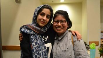 Two students posing for camera