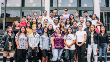 LArge group of students posing for picture